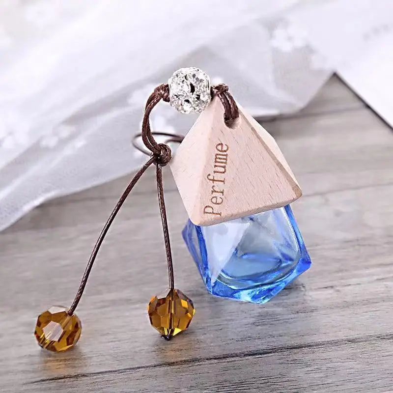 Wholesale 5ml 8ml Colorful Hanging Car Fragrance Diffuser Perfume Glass Bottle With Wooden Cap