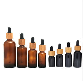 Luxury Clear Amber Glass Face Serum Dropper Bottle Bamboo Lid Luxury Cosmetic Packaging for Essential Body Oil Skin Care Serum