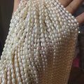 5-6 mm Rice Shape Nature Pearl Wholesale Freshwater Loose Pearl Strandmini Freshwater Pearl AA Good Quality