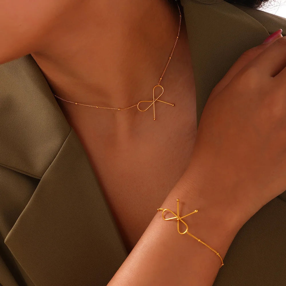 Trendy Simple 18K Gold Plated Stainless Steel Hollow Bow Knot Pendant Women Necklace Bracelet Jewelry Set
