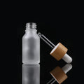 Factory Direct Bamboo Lid Essential Oil Bottle Frosted Glass Dropper Bottle 30ml Skin Care Cosmetic Container with Dropper