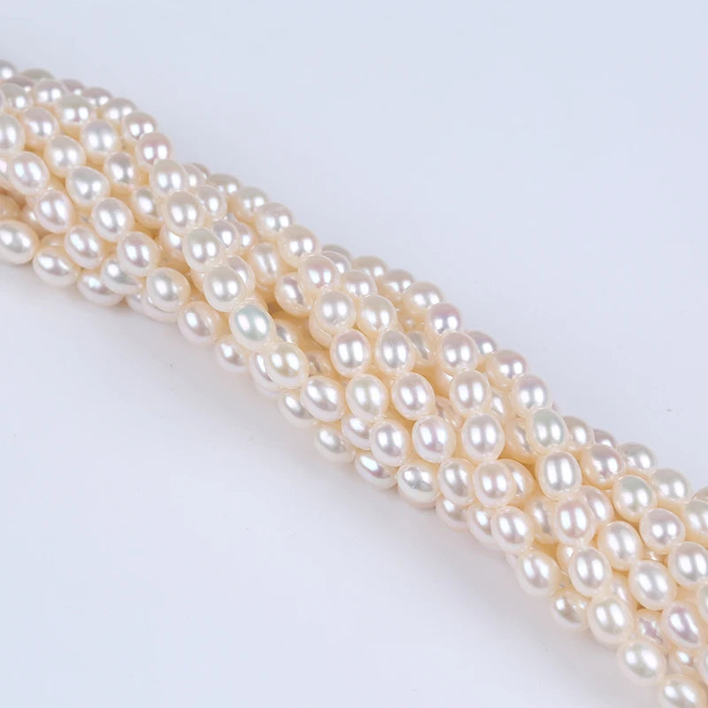 Zhuji Pearls Wholesale AA Quality 5.5-6mm Rice Shape Natural Freshwater Pearls China Zhejiang Model 202301102 Third Party