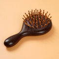 Factory Wholesale Portable Pocket Style Salon Comb Natural Sandalwood Wooden Airbag Massage Comb Fluffy Hair Styling Comb
