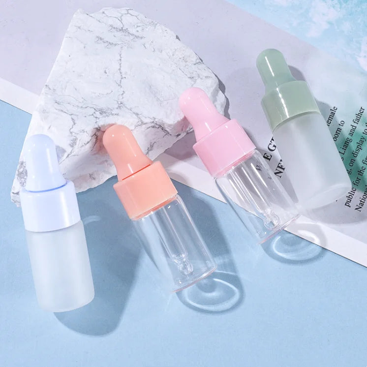 Wholesale Sample Serum Cosmetic Packaging 1ml 2ml 3ml 5ml Empty Small Glass Dropper Essential Oil Bottle