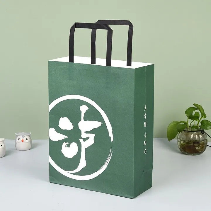 Custom Offset Printed 157gsm Recyclable Art Paper Flat Paper Rope Handle Take Away Shopping Bags for Cake Food Eco-Friendly
