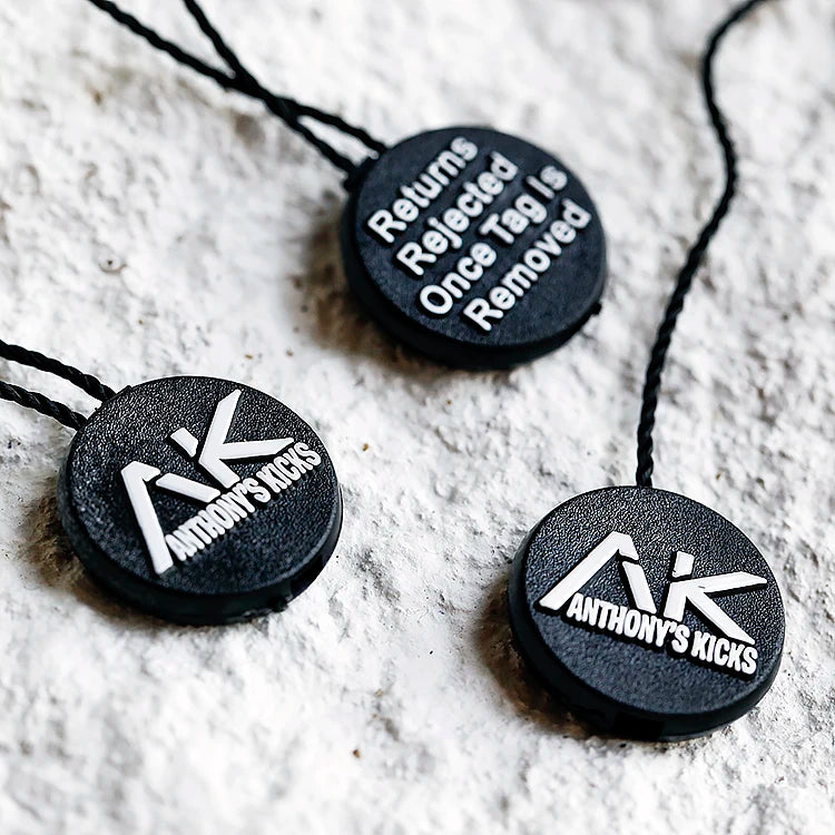 Custom Clothing Name Logo Plastic ABS String Tag Garment Seal Tag Eco-Friendly Embossed HangTag String Swing Tag for Shoes Bags