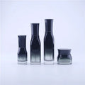 New Cosmetics Quartet Gradient Black Glass Essence Lotion Pressing Pump Sprayer Cream  Packing Bottle with Wood Grain Cover