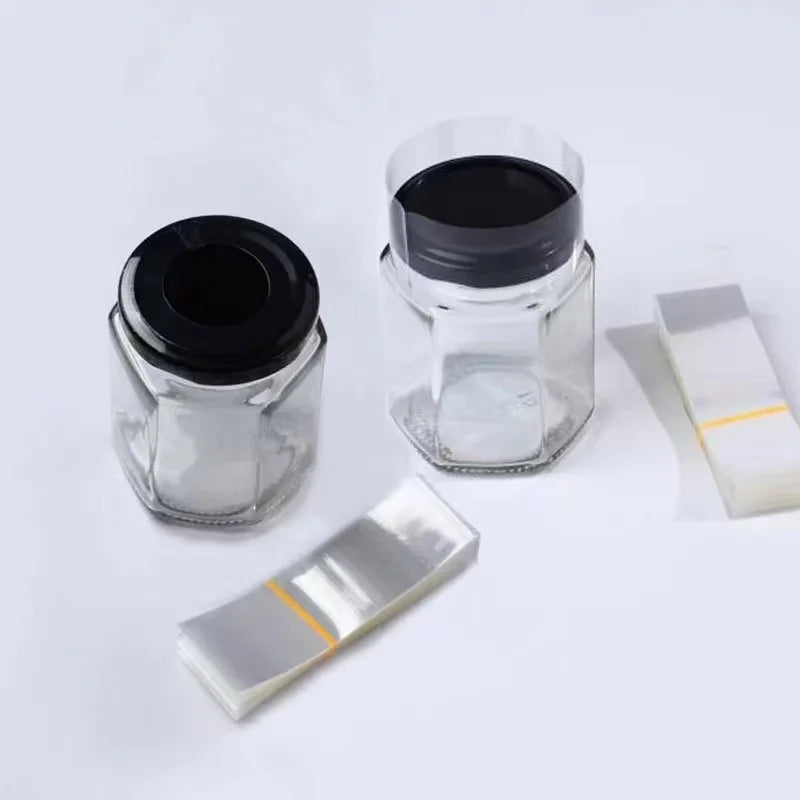 Customized PVC Transparent Red Green Shrink Film for Food Beverage for Sealing Glass Jars Bottle Milk Chocolate Salad Chocolate