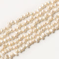 Wholesale 15 Inches 5-6mm/6-7mm Freshwater White Pearl Beads Cross Hole Irregular Natural Loose Pearls for Bracelet Necklace DIY