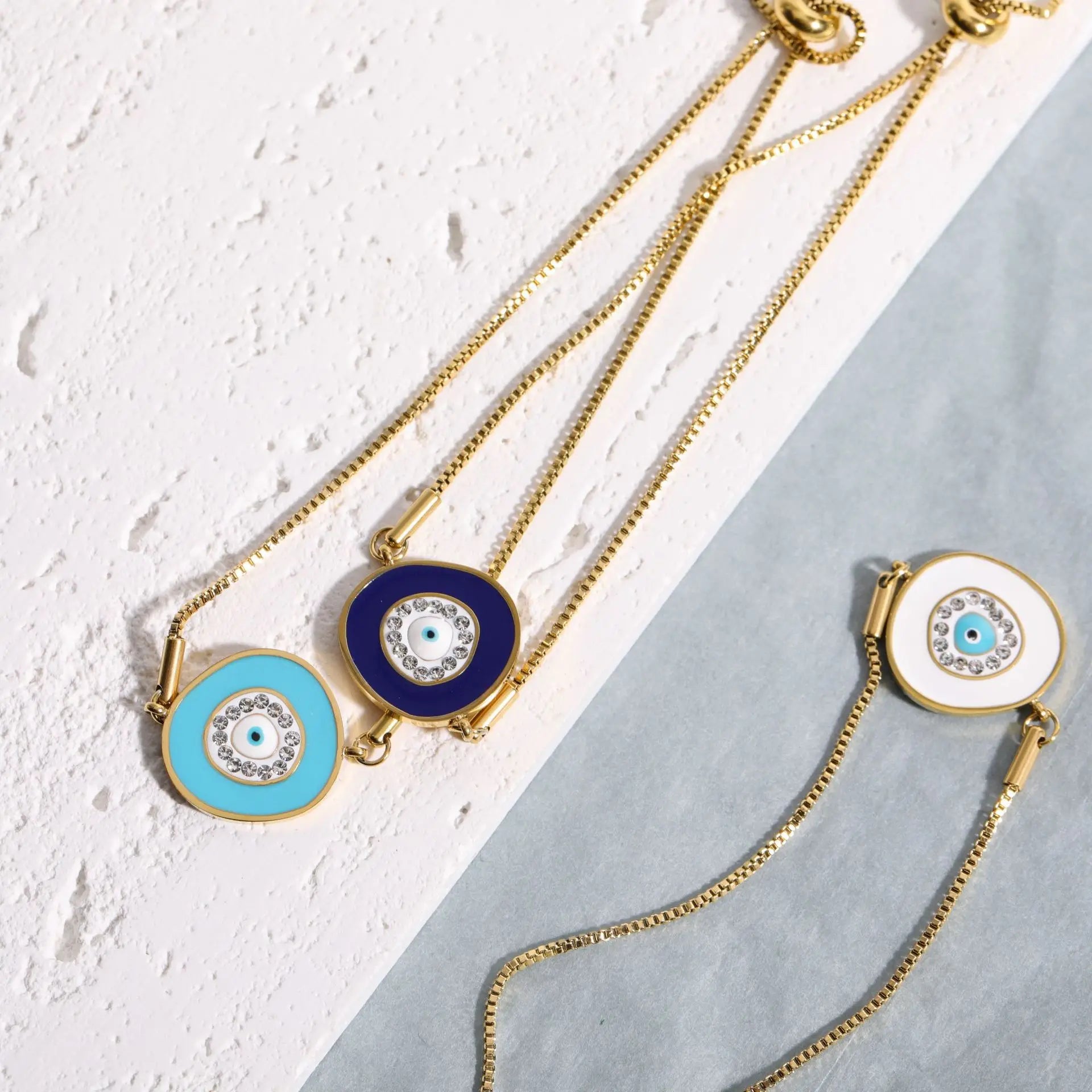 Wholesale Western Stainless Steel 18K Gold Plated Adjustable String Round Shell Evil Metal Eyes Bracelet with Zircon Inlay