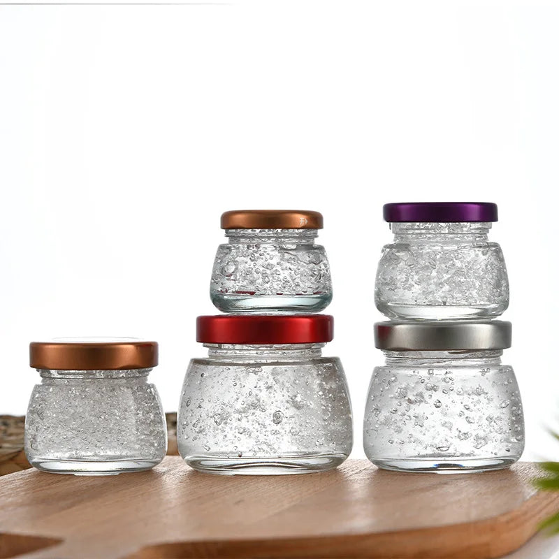 Wholesale Fancy Mini Round Bird Nest Glass Bottle With Metal Lid Small Glass Jars 50ml 75ml 100ml 150ml for Honey Jam Wedding