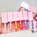 Low MOQ Vegan Flavoring Oil Private Label Lip Plumper Moisturizing Pink Glitter Flavor Color Changing Lip Oil