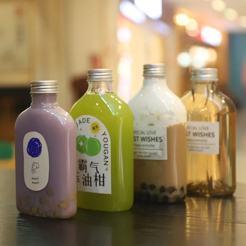 Wholesale Flat Bottle Disposable PET Food Grade Plastic Milk Tea Cold Tea Beverage Takeaway Bottle