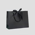 Luxury Branding Custom Kraft Paper Shopping Bag Offset Printed Logo Premium Black Recyclable Ribbon Satin Handle Gift Packaging