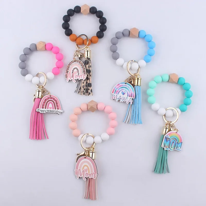 Colorful Silicon Rainbow Bracelet Keychain Wristlet Rechargeable Beaded Bracelet Keychain Wallet PU Leather Tassel Doll