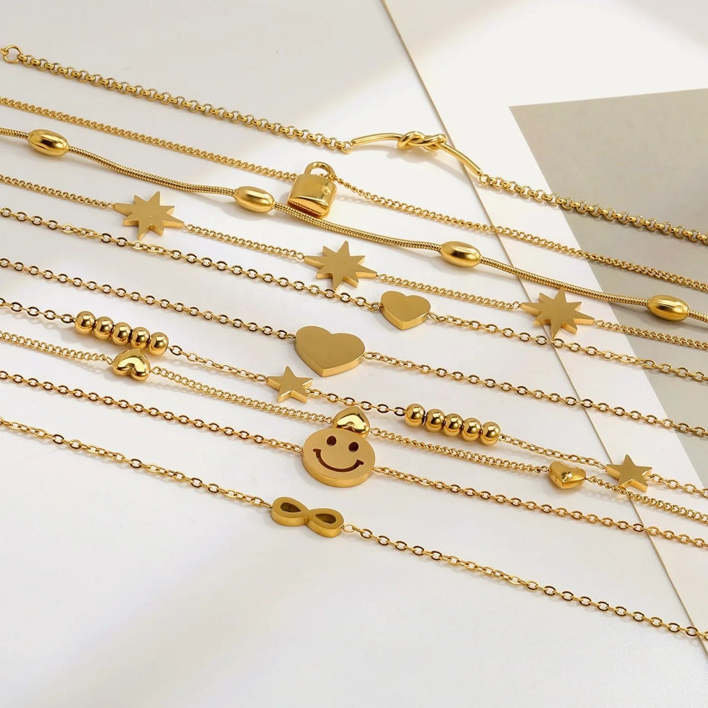 Wholesale Custom 18K Gold Plated Engraving Jewelry Bracelet Waterproof Stainless Steel Star Infinite Symbol Heart Charm Bracelet