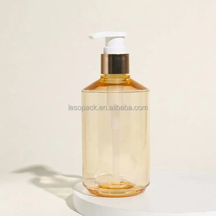 Custom 300ml PETG Transparent champagne Slope Shoulder Bottle with Matte Gold Lotion Pump Cosmetic Packaging