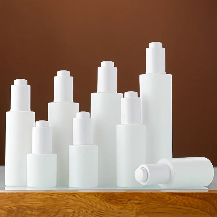 Custom White Lotion Serum Storage Cosmetic Packaging 20ml 50ml 100ml Empty White Nail Polish Oil Glass Bottles