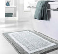 China Cheap 100% Polyester Microfibre Jacquard Floor Soft Bath Mat Bathroom Rugs