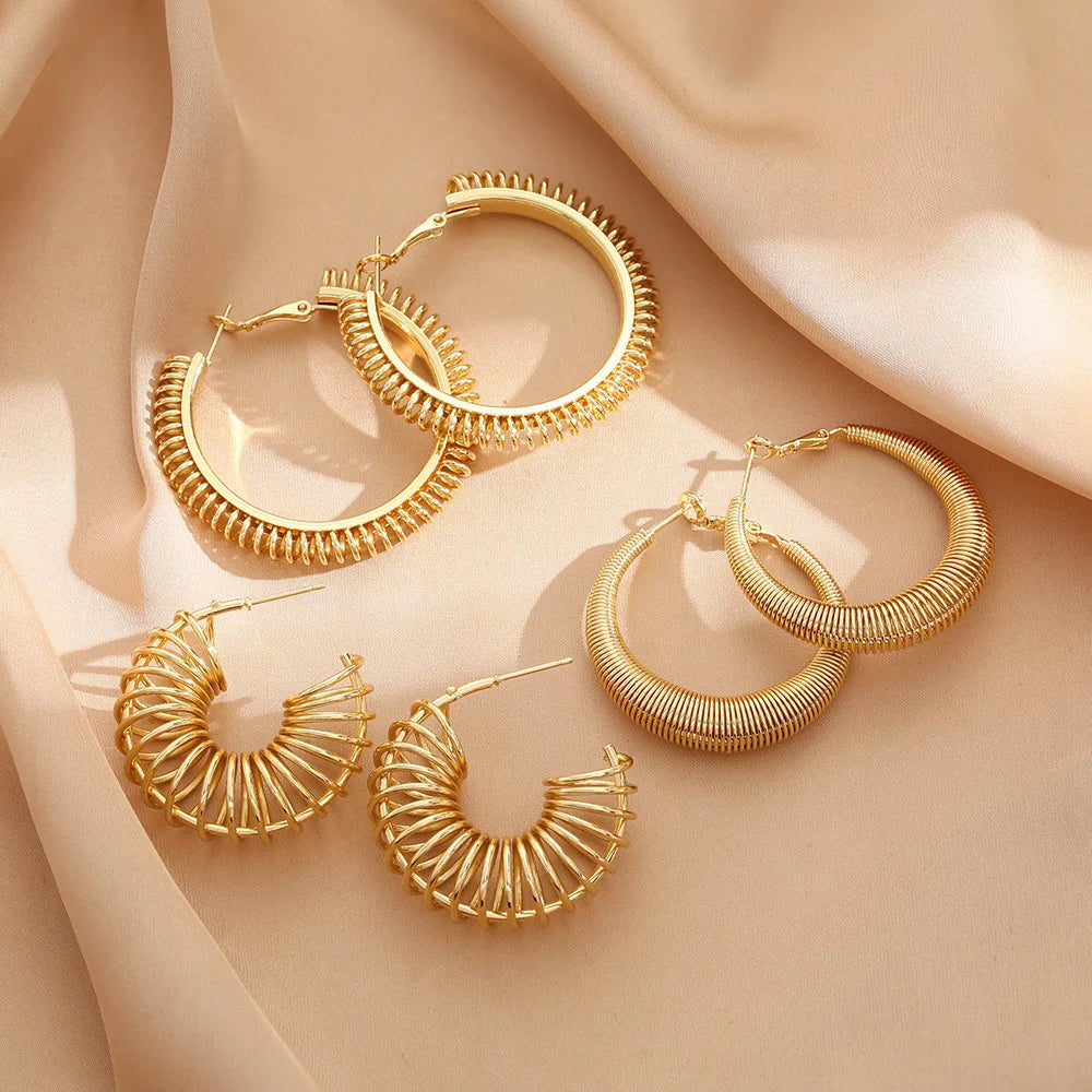 Fashion New Gold Metal Exaggerated Circle Hollow Spring Spiral Wound Hoop Earrings for Women