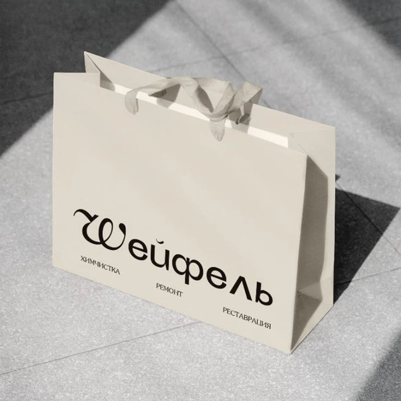 New Design Custom Printed Paper Bags  Cardboard Luxury White Kraft Paper Gift Bag With Ribbon Handle