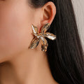 Manufacture Wholesale Middle East Exaggerated Alloy Metal Flower Stud Earrings Five Petal Flower Gold Earrings for Women