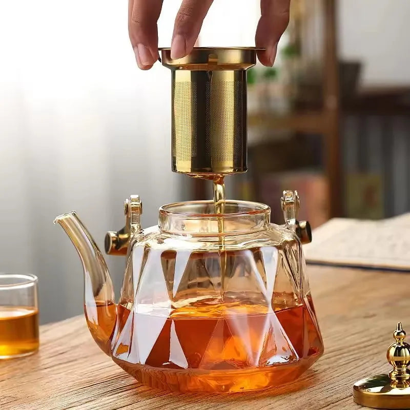 New Design Hot Sale 1000ml High Borosilicate Heat Resistant Diamond Glass Teapot with Copper Handle and Strainer
