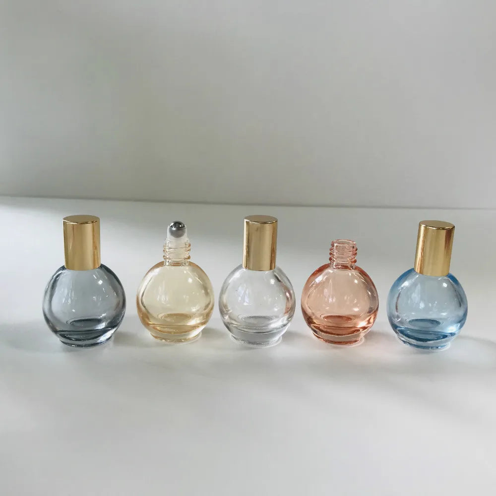 Wholesale 10ml Rounded Shape Blue clear pink Yellow Grey Metallic Roll on Essential Oil Glass Bottle With Shiny Gold Cap