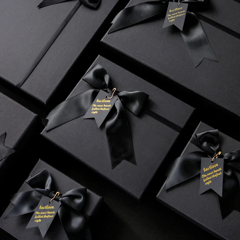 Luxury Black Bow Ribbon Gift Box Matt Lamination Embossing Custom Logo for Perfume Lipstick Eye Cream Packaging (Biodegradable)