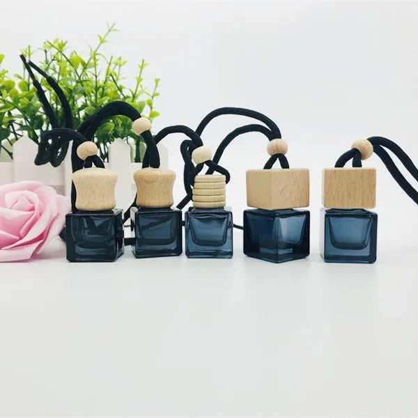 Wholesale 8ml air Freshener Diffuser Empty Frosted Black Car Hanging Perfume Bottle with Wooden Cap