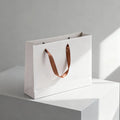 Customized Luxury Art Paper Bag Shoes Printed Brand Clothing Wedding Jewelry Cosmetics Laminated for Shopping Gift Packaging