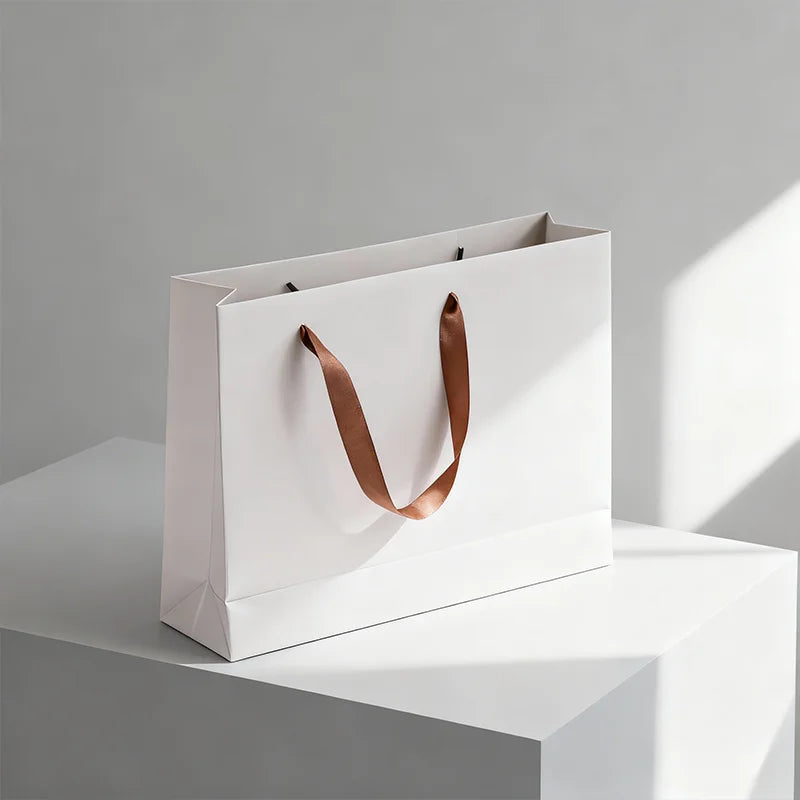 Customized Luxury Art Paper Bag Shoes Printed Brand Clothing Wedding Jewelry Cosmetics Laminated for Shopping Gift Packaging