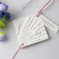 FinRu Factory Wholesale Wardrobe Air Freshener Hanging Scented Ceramic Aroma Plaster Porcelain Flower Essential Oil Diffuser