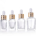 In Stock 10ml 15ml 20ml 30ml 50ml 100ml square clear Thick Bottom Glass Dropper Bottle for Essential Oil With Gold Dropper