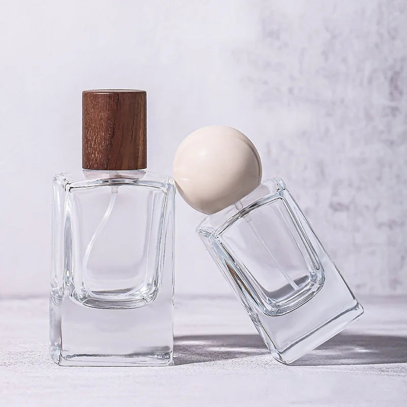 Wholesale  30 ml 50ml Empty Long  Perfume Glass Bottle Thick Bottom  Crimp  Parfum Glass Bottles with Wooden Cap