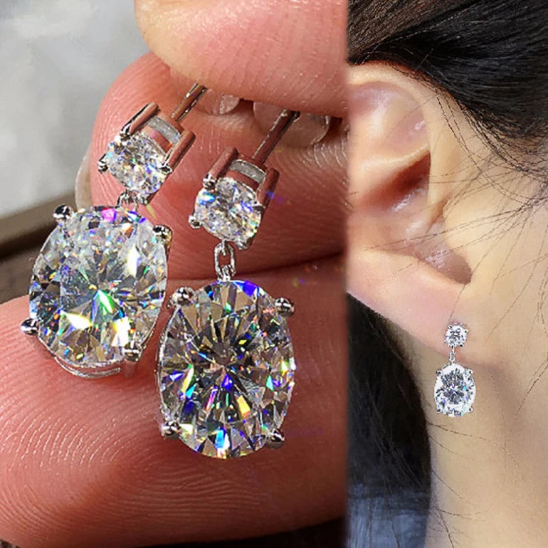 Huitan Custom Hot Selling Oval Design Dazzling Cubic Zirconia Earrings for Luxury Bride Silver Plated Pendant Earrings for Women