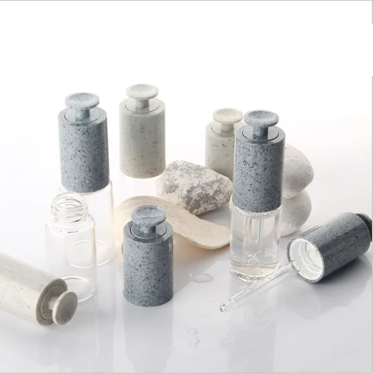 New Design Push Button Marble Flat Shoulder 15ml 30ml Essential Oil Bottle Customize Frosted Cosmetic Glass Dropper Bottle