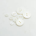 China Button Maker Factory Price Custom Size Round Natural Two Holes Real Mop Pearl White Shell Buttons