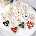 Shiny Gold Heart Evil Eye Keychains Gold Plated Heart Pendant Evil Eye Enamel and Zircons Keychains
