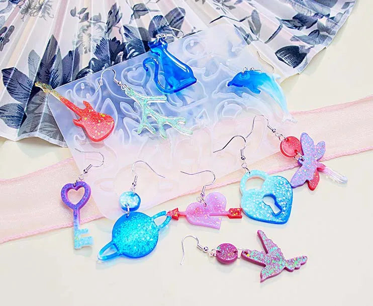 Hot Selling DIY Crystal Drop Glue Multiple Pendant Earring Molds Trojan Cat Bow Flower Ear Jewelry Silicone Mold