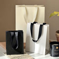 Customized Luxury Small White Gift Bag Jewelry Cosmetic Makeup Perfume Package Paper Bags with Black Ribbon Handle