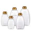 Wholesale Food Grade Plastic Bottles 50ml to 500ml Honey Jars and Sauce Containers Empty Vessels