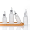 Silk Screen Logo Label Cosmetic Nail Polish Serum Glass Bottle 20ml Silver Top Frosted Transparent Essential Oil Dropper Bottle