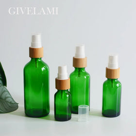 Empty 15ml 30ml 50ml 100ml Natural Packaging Round Clear Green Fine Mist Spray Bottle with Bamboo Wooden Lid for Skin Care
