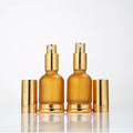 New Design Gold 30ml Essential Oil Pump Bottle Cosmetic Spray Glass Bottle for Skin Care Serum