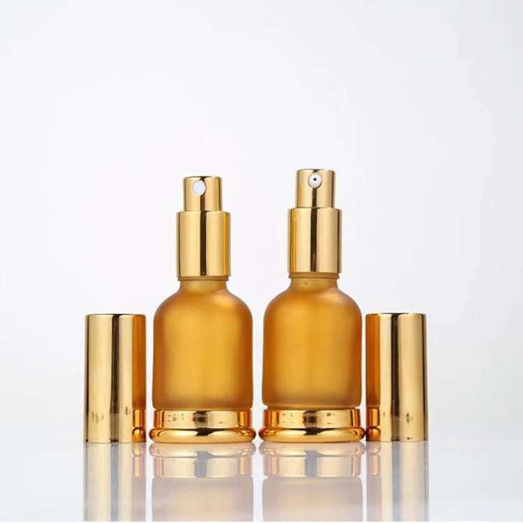 New Design Gold 30ml Essential Oil Pump Bottle Cosmetic Spray Glass Bottle for Skin Care Serum