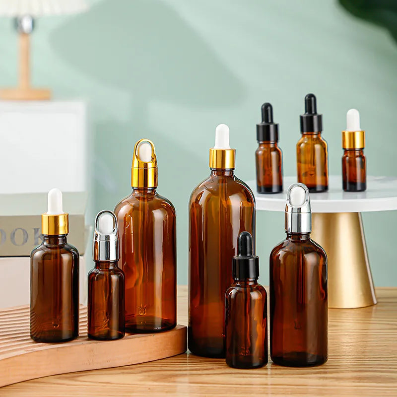 Wholesale 5ml 10ml 12ml 15ml Clear Glass Dropper Bottle PP Plastic Black Cap Custom Logo Essential Oil Skin Care Cream Packaging