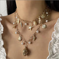 Boho Shell Starfish Conch Pendant Necklace for Women Multilayer Pearl Metal Chain Choker Beach Party Necklace Jewelry Set