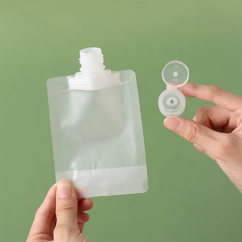 Stock clear 30ml 50ml 100ml Travel Size Refillable Empty Squeeze Pouch Toiletry Lotion Shampoo and Conditioner Squeezable Bags