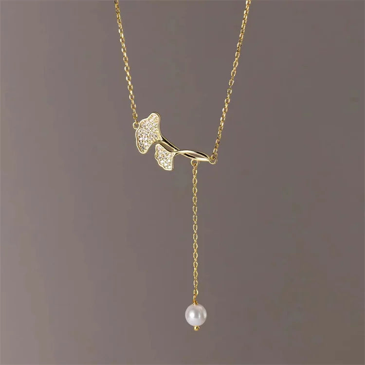 Wholesale New Minimalist Women Fashion Jewelry Diamond Pearl Necklace Tassel Ginkgo Leaf Necklace